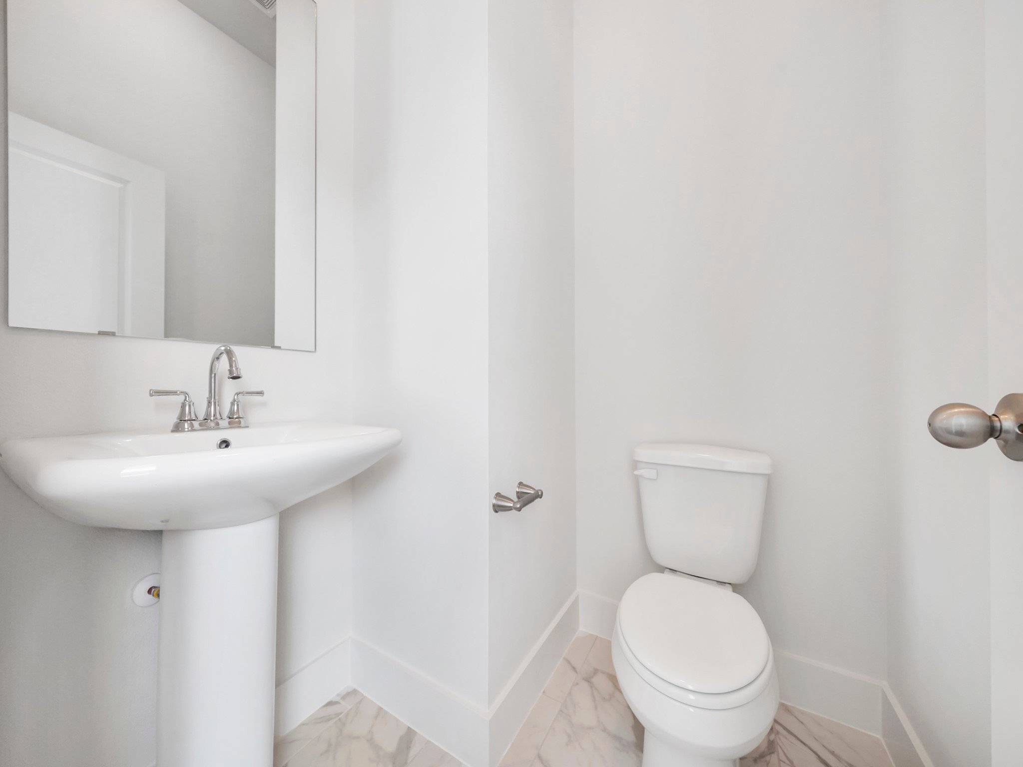 2007 Bauer Drive, Unit A Houston, TX 77080 - Photo 18 of 35 a bathroom with a toilet sink and mirror