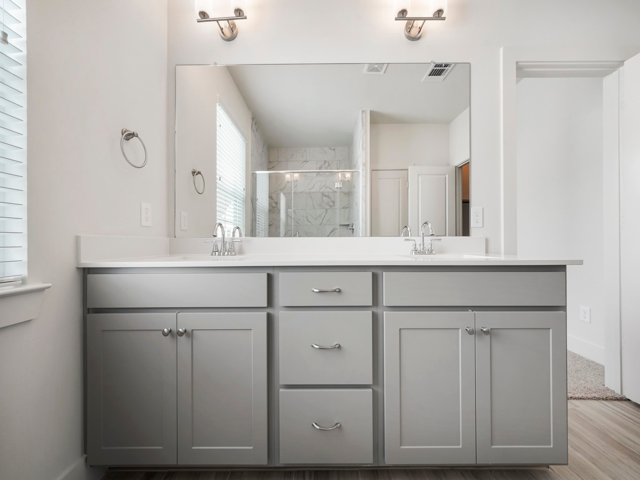 2007 Bauer Drive, Unit A Houston, TX 77080 - Photo 24 of 35 a bathroom with a sink vanity and mirror