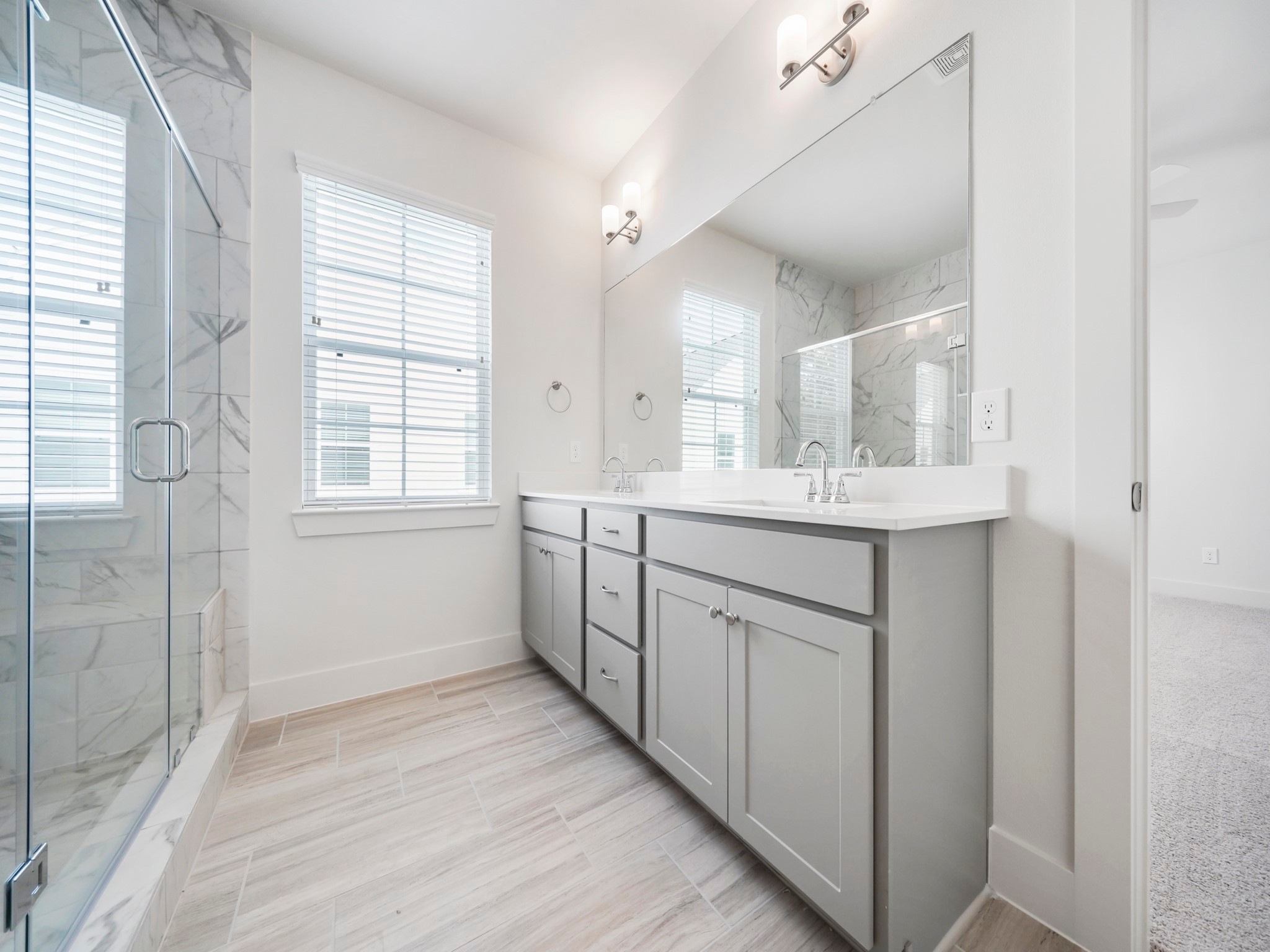 2007 Bauer Drive, Unit A Houston, TX 77080 - Photo 28 of 35 a bathroom with a sink a vanity and a mirror