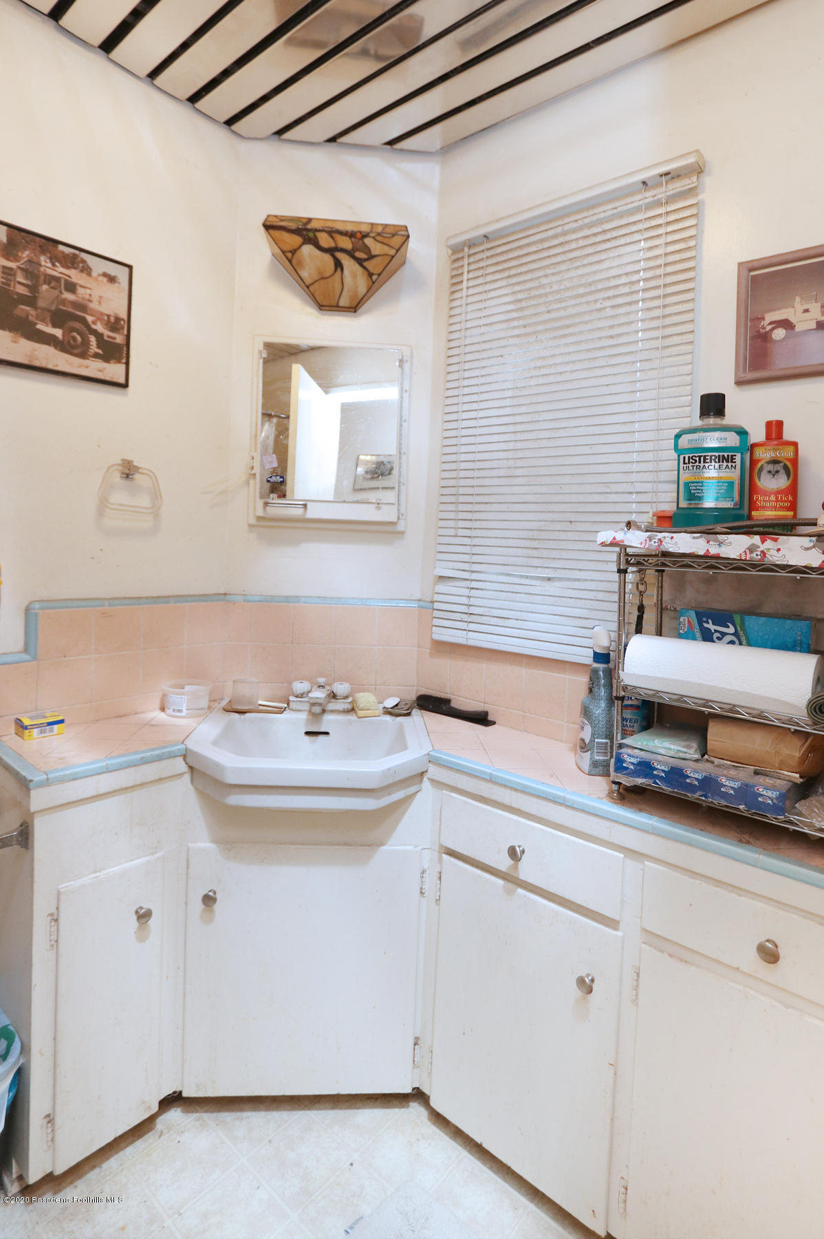 1867 Layton Street Pasadena, CA 91104 - Photo 20 of 22 a bathroom with a sink and a mirror