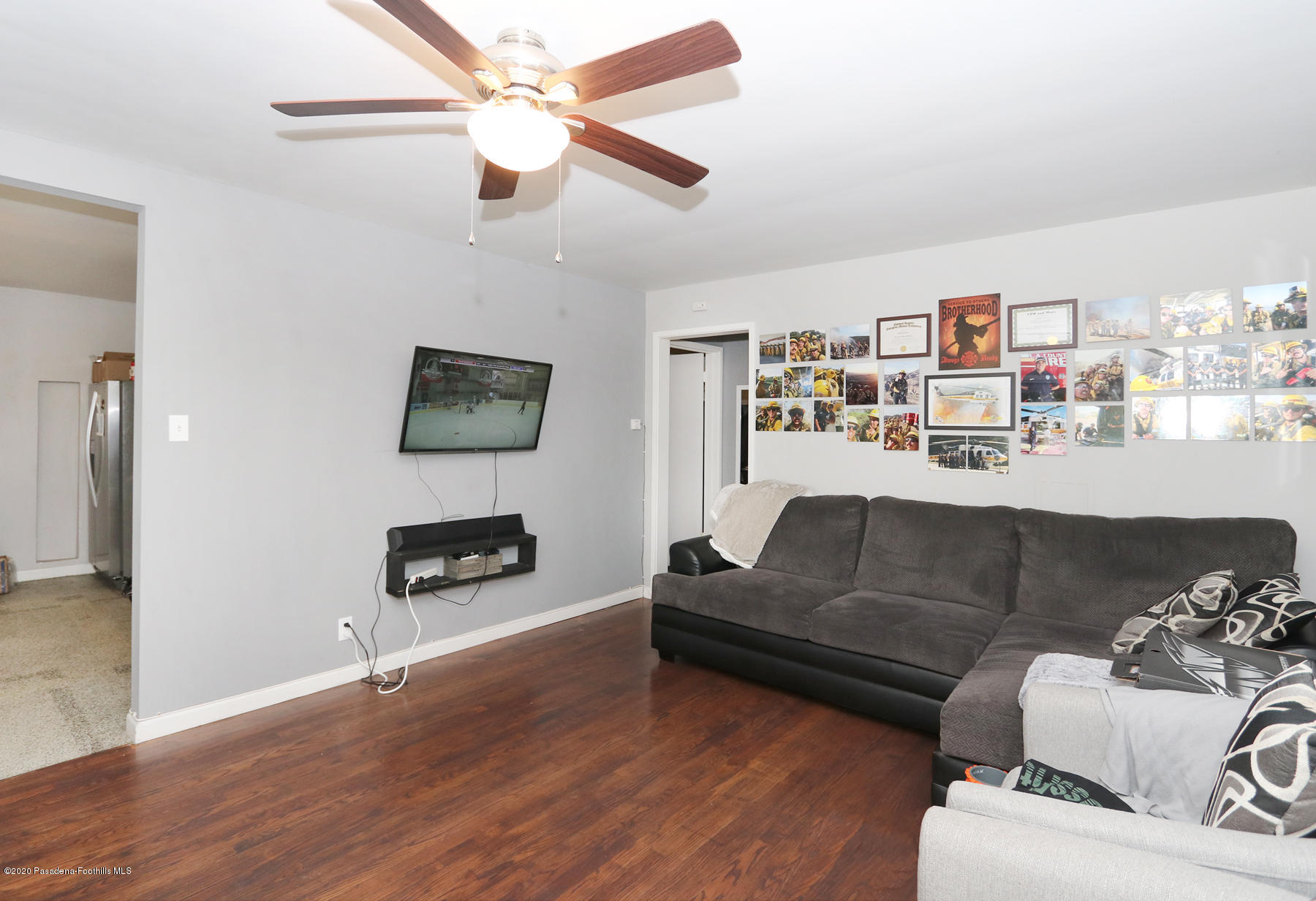 1867 Layton Street Pasadena, CA 91104 - Photo 4 of 22 a living room with furniture and a wooden floor
