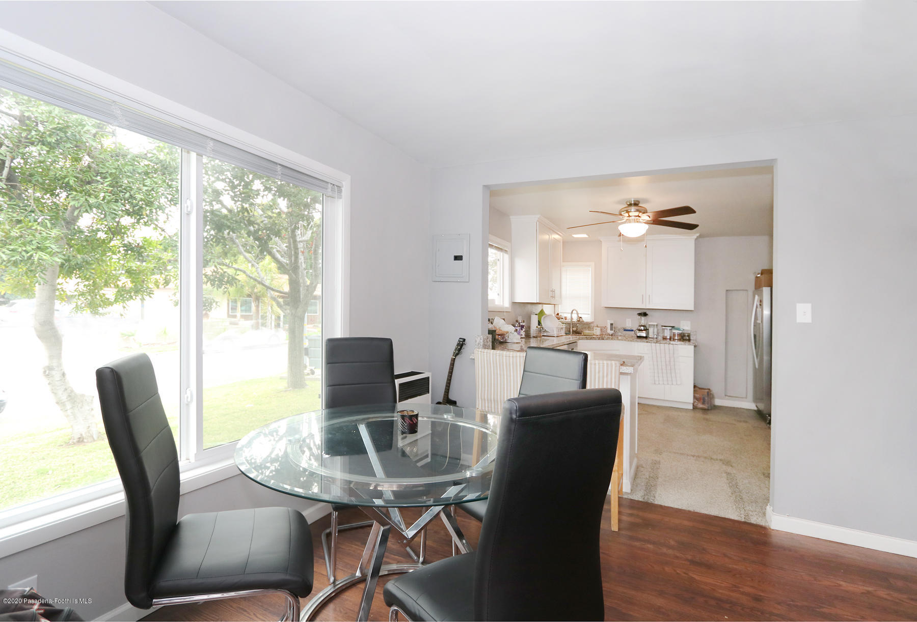 1867 Layton Street Pasadena, CA 91104 - Photo 6 of 22 a view of a dining room with furniture window and wooden floor