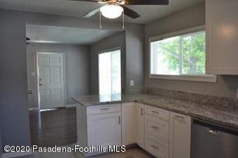 1867 Layton Street Pasadena, CA 91104 - Photo 9 of 22 a bathroom with a sink a vanity and a mirror