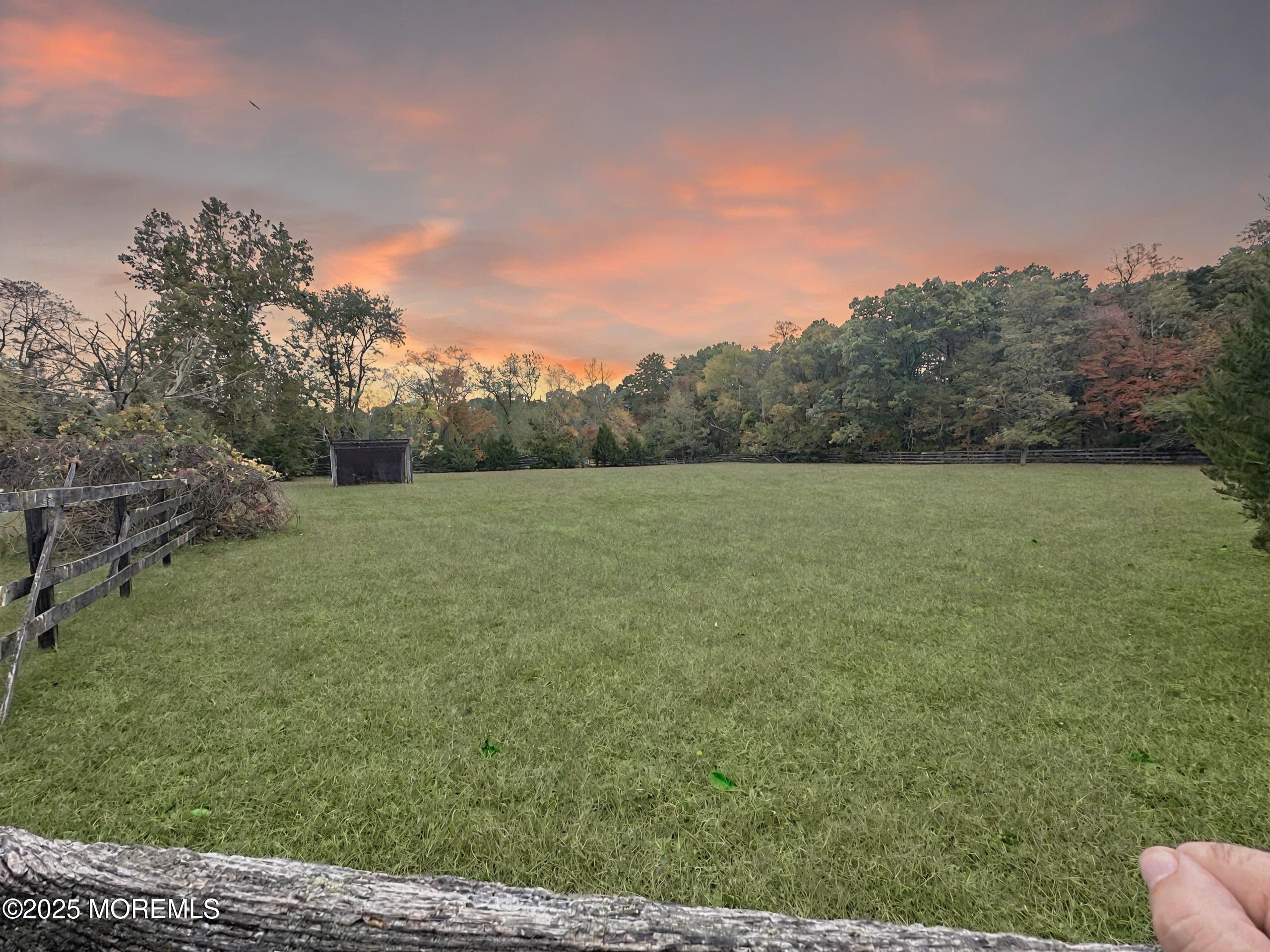 3 West Caines Drive Cream Ridge, NJ 08514 - Photo 17 of 22 a view of a field with trees in the background