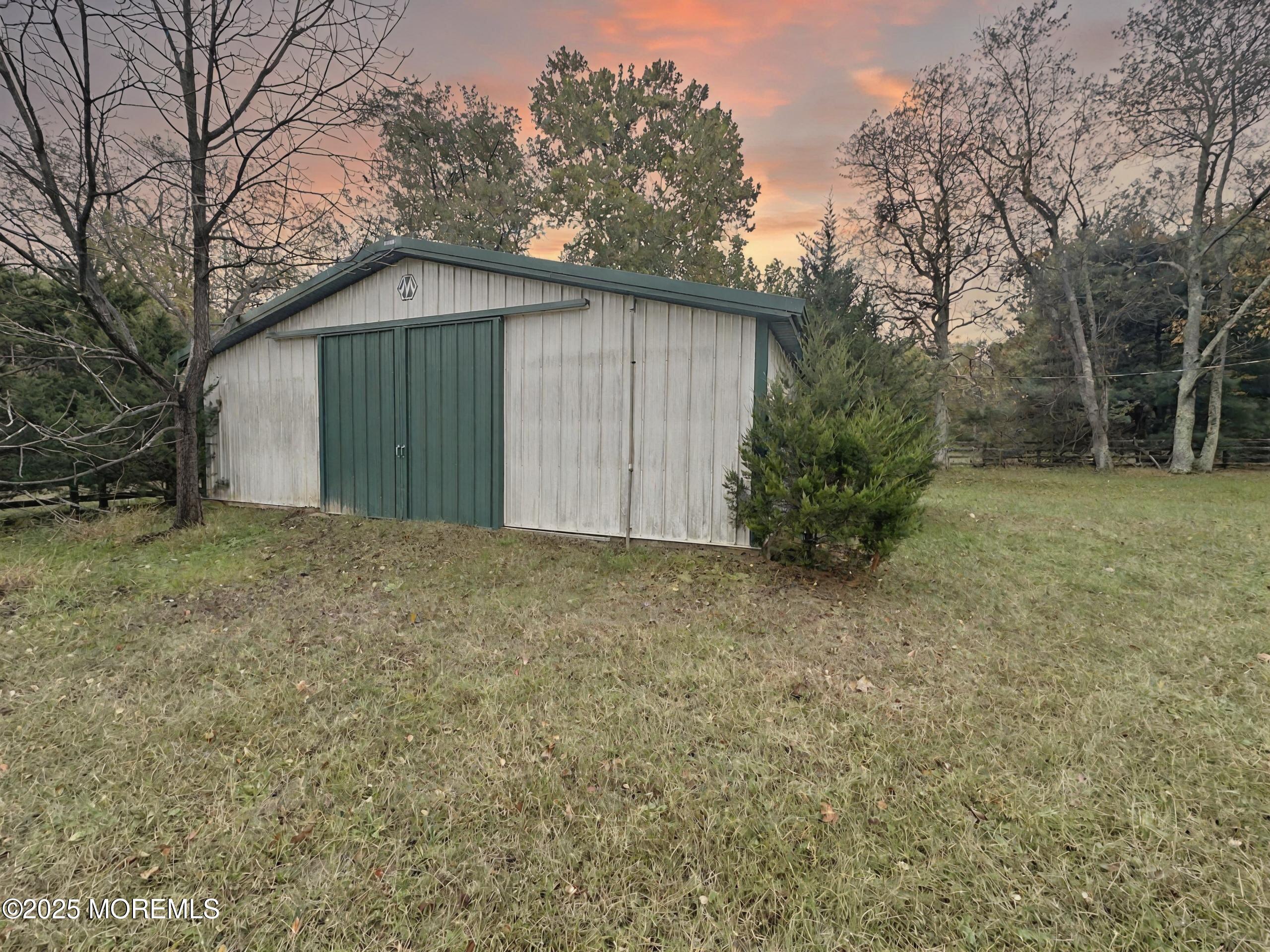 3 West Caines Drive Cream Ridge, NJ 08514 - Photo 18 of 22 a front view of a house with garden