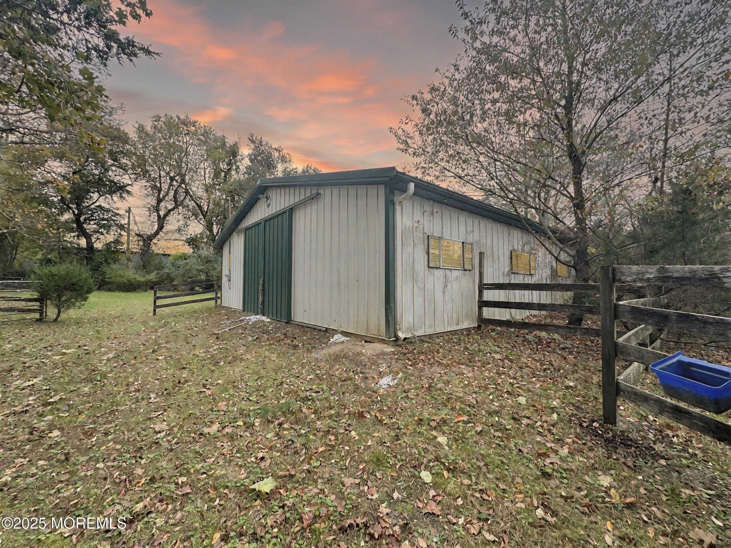 3 West Caines Drive Cream Ridge, NJ 08514 - Photo 19 of 22 a backyard of a house with lots of green space