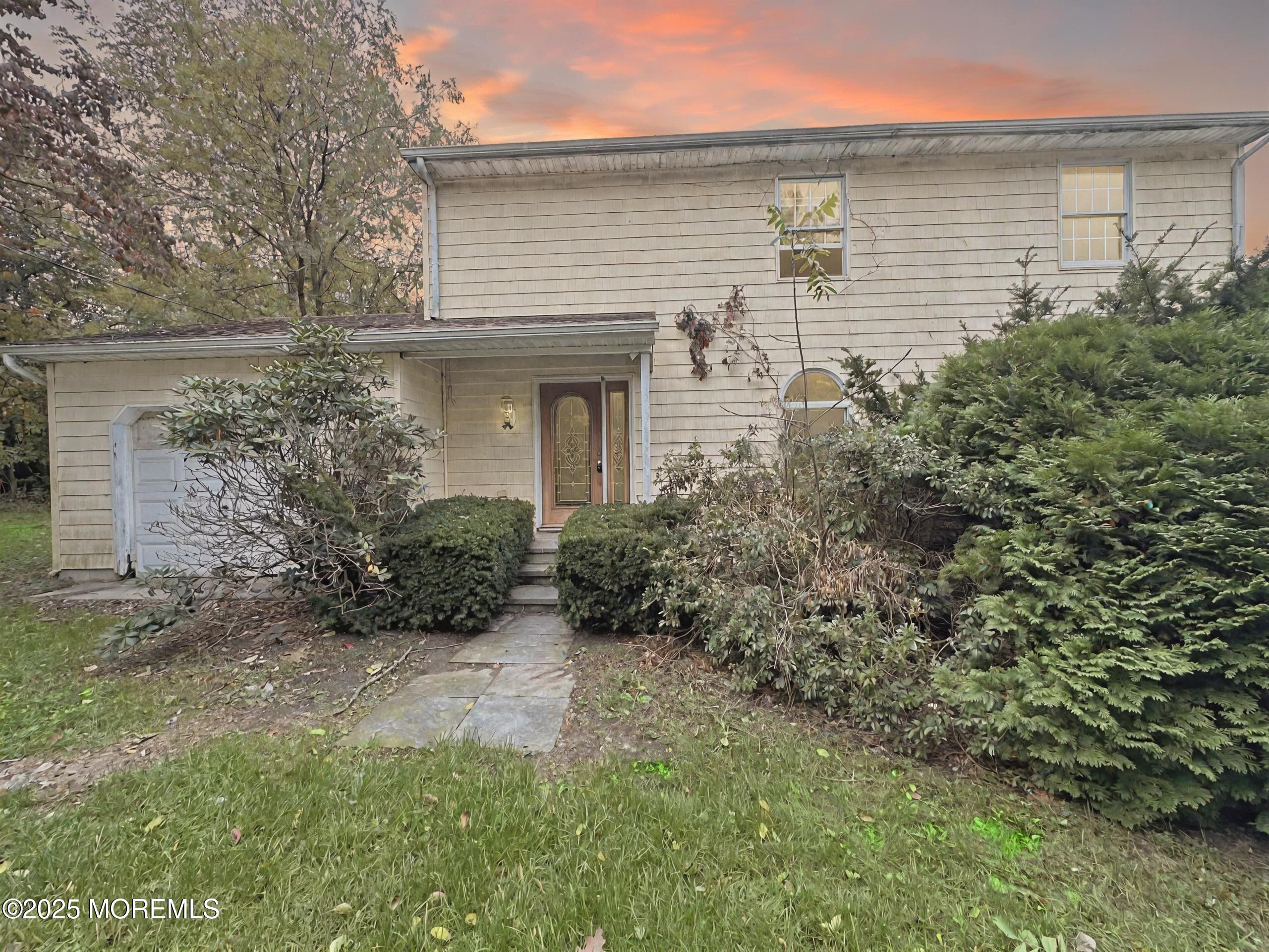 3 West Caines Drive Cream Ridge, NJ 08514 - Photo 2 of 22 a view of backyard of house with green space