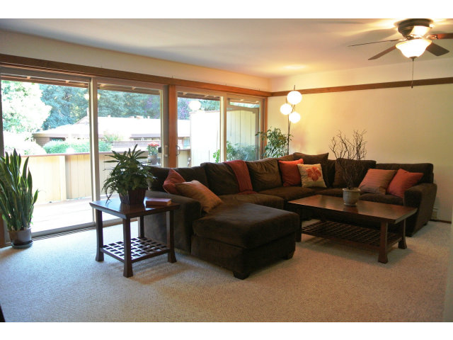 500 West Middlefield Road, Unit 154 Mountain View, CA 94043 - Photo 1 of 16 a living room with furniture and a large window