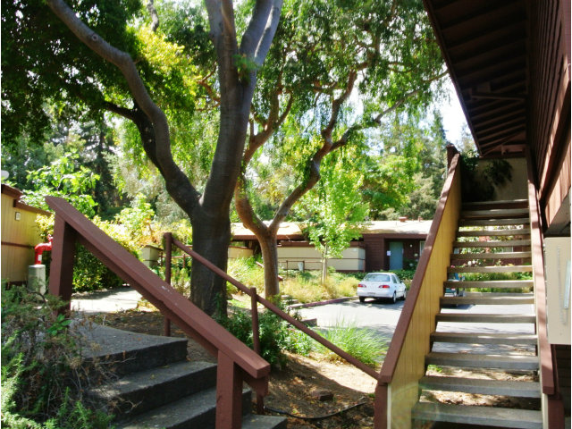 500 West Middlefield Road, Unit 154 Mountain View, CA 94043 - Photo 13 of 16 a view of a balcony with wooden floor and fence