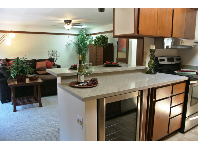 500 West Middlefield Road, Unit 154 Mountain View, CA 94043 - Photo 6 of 16 a kitchen with a sink cabinets and a stove top oven