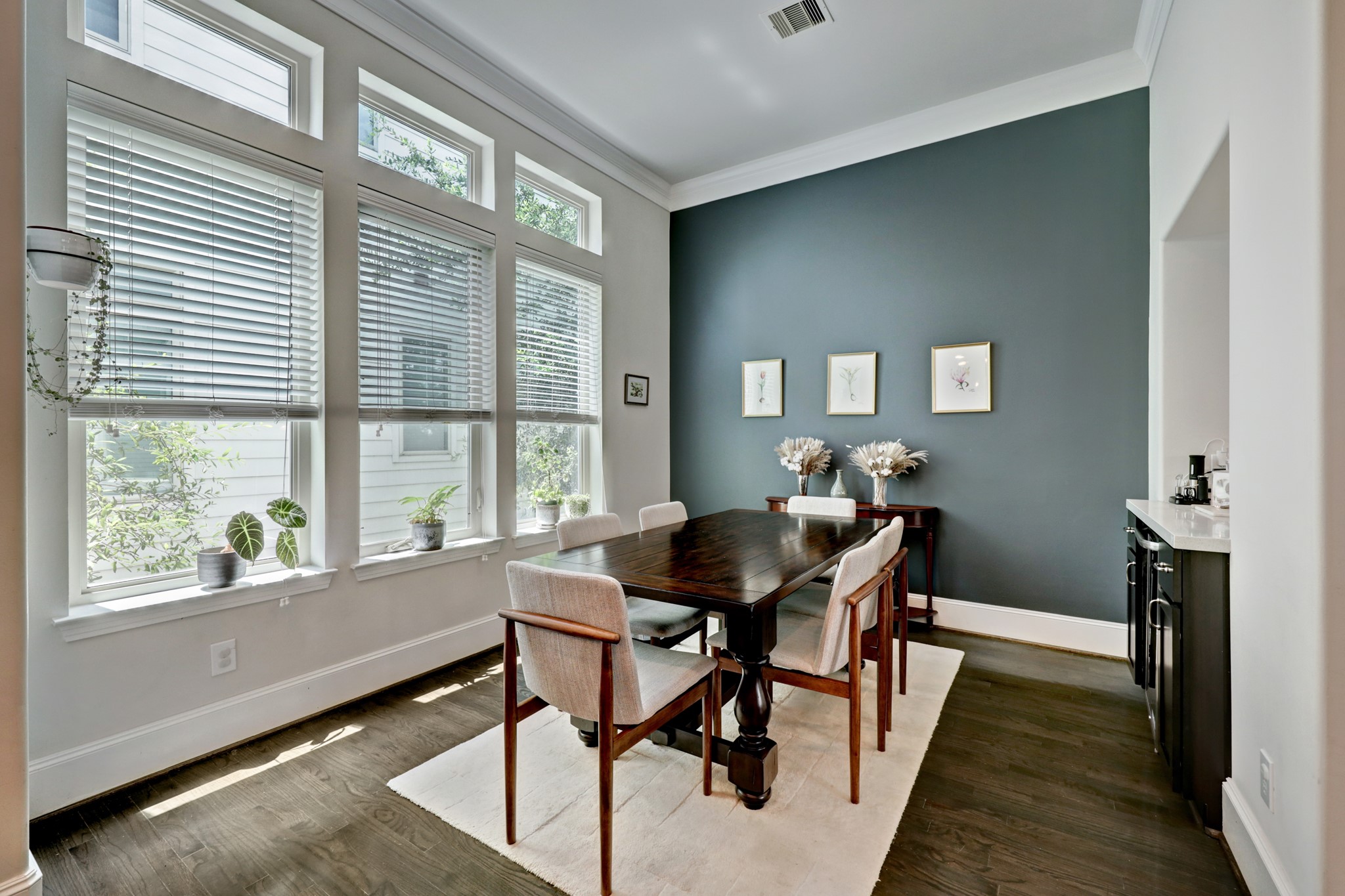 2231 Chenevert Street Houston, TX 77003 - Photo 11 of 26 a view of a dining room with furniture window and wooden floor