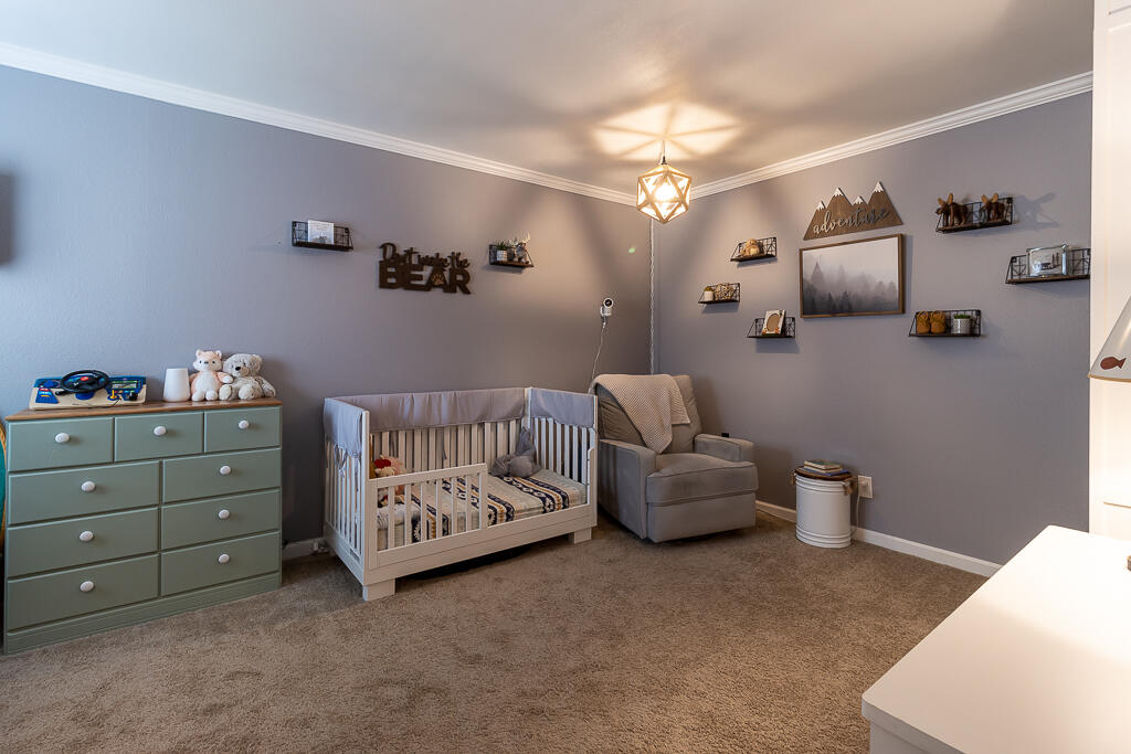 31355 The Old Road, Unit E Castaic, CA 91384 - Photo 19 of 38 a bed room with furniture and a window