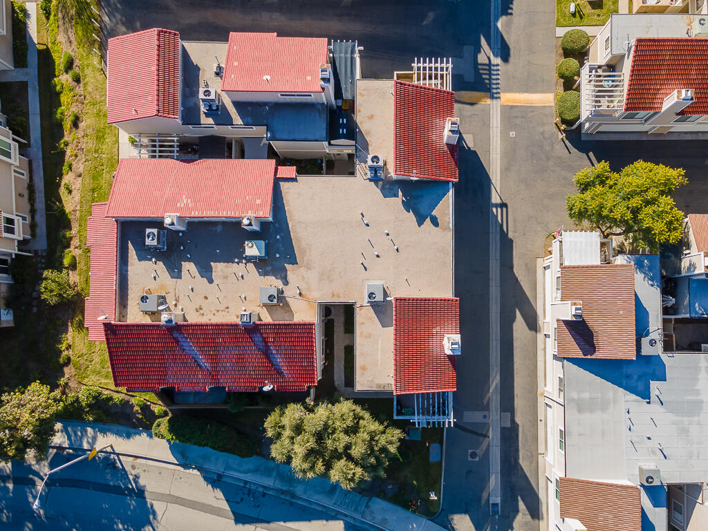 31355 The Old Road, Unit E Castaic, CA 91384 - Photo 2 of 38 an aerial view of residential houses with outdoor space