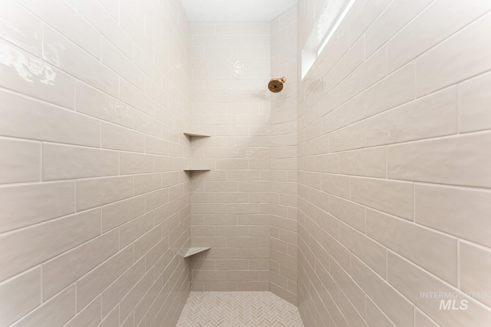 13344 North Spring Creek Way Boise, ID 83714 - Photo 18 of 39 Full bathroom with tiled shower