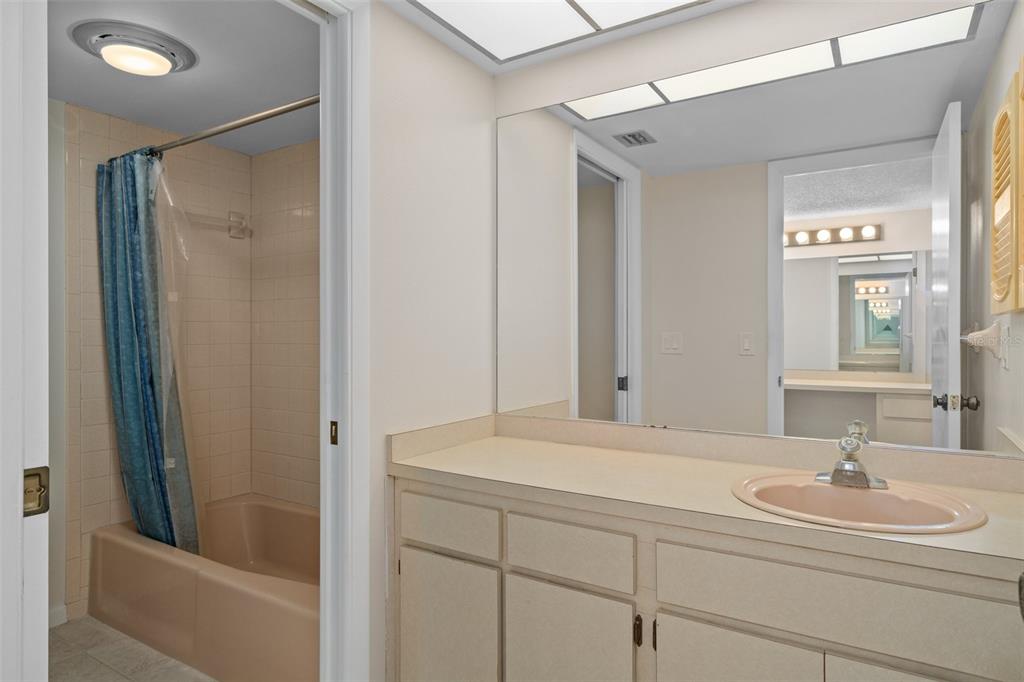 8211 Brent Street, Unit 836 Port Richey, FL 34668 - Photo 21 of 55 a bathroom with a sink and a mirror