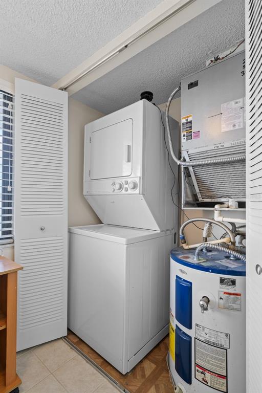 8211 Brent Street, Unit 836 Port Richey, FL 34668 - Photo 26 of 55 a utility room with dryer and washer