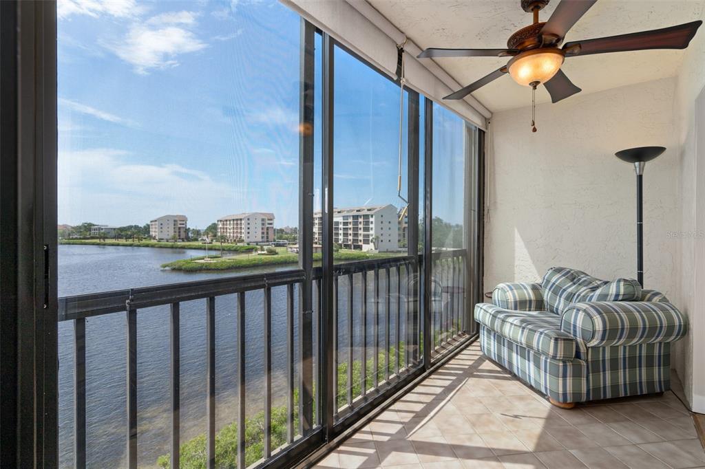 8211 Brent Street, Unit 836 Port Richey, FL 34668 - Photo 27 of 55 a balcony with furniture