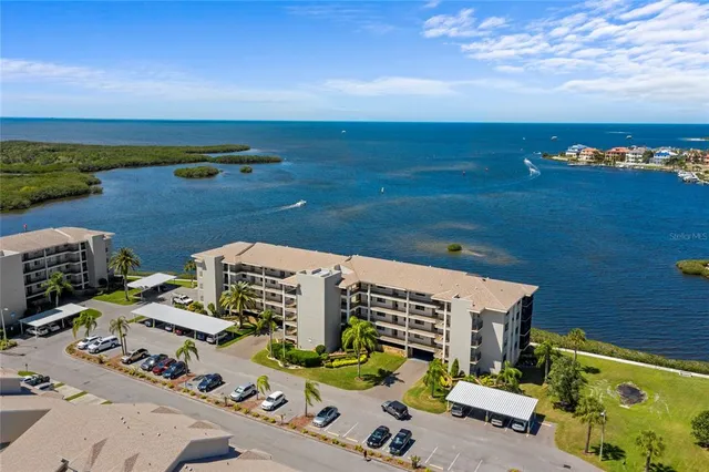 an aerial view of a house with outdoor space