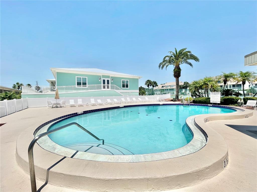 8211 Brent Street, Unit 836 Port Richey, FL 34668 - Photo 37 of 55 a view of swimming pool with outdoor seating