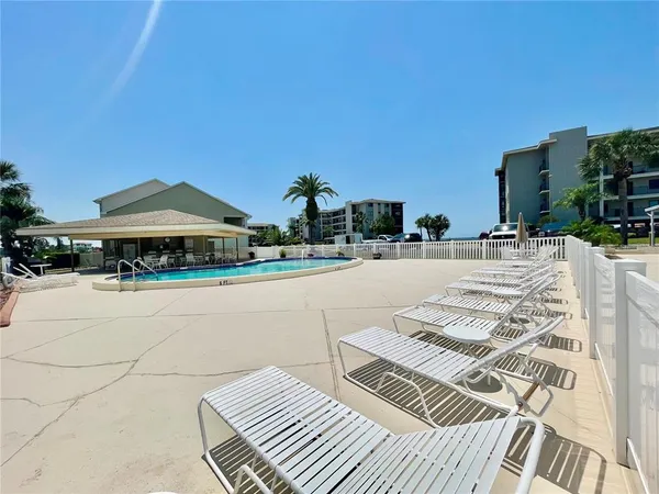 a view of a terrace with chairs