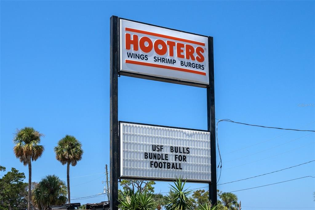 8211 Brent Street, Unit 836 Port Richey, FL 34668 - Photo 50 of 55 a sign on the side of a building