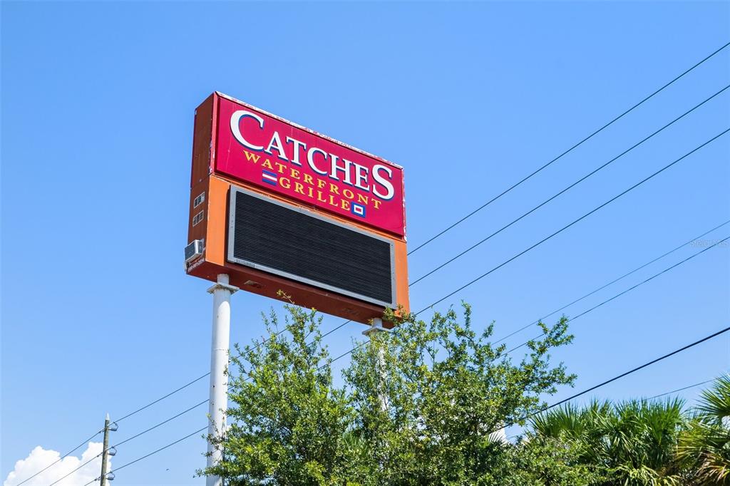 8211 Brent Street, Unit 836 Port Richey, FL 34668 - Photo 53 of 55 a sign broad in front of a building