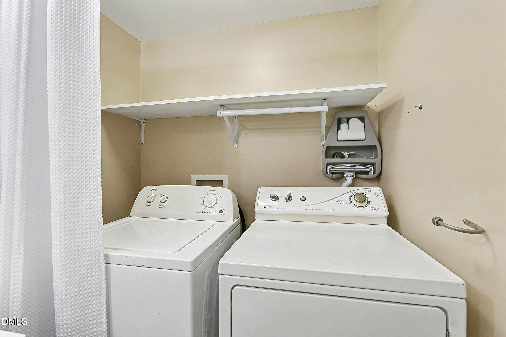 7228 Cleveland School Road Garner, NC 27529 - Photo 20 of 28 a utility room with dryer and washer