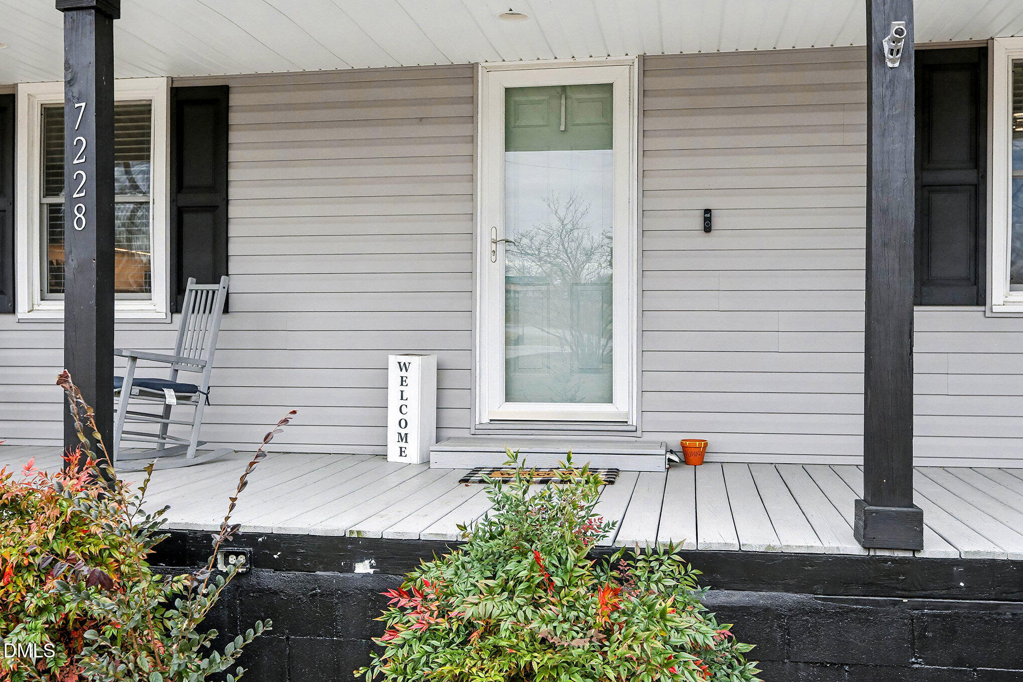 7228 Cleveland School Road Garner, NC 27529 - Photo 5 of 28 a view of front door and potted plants