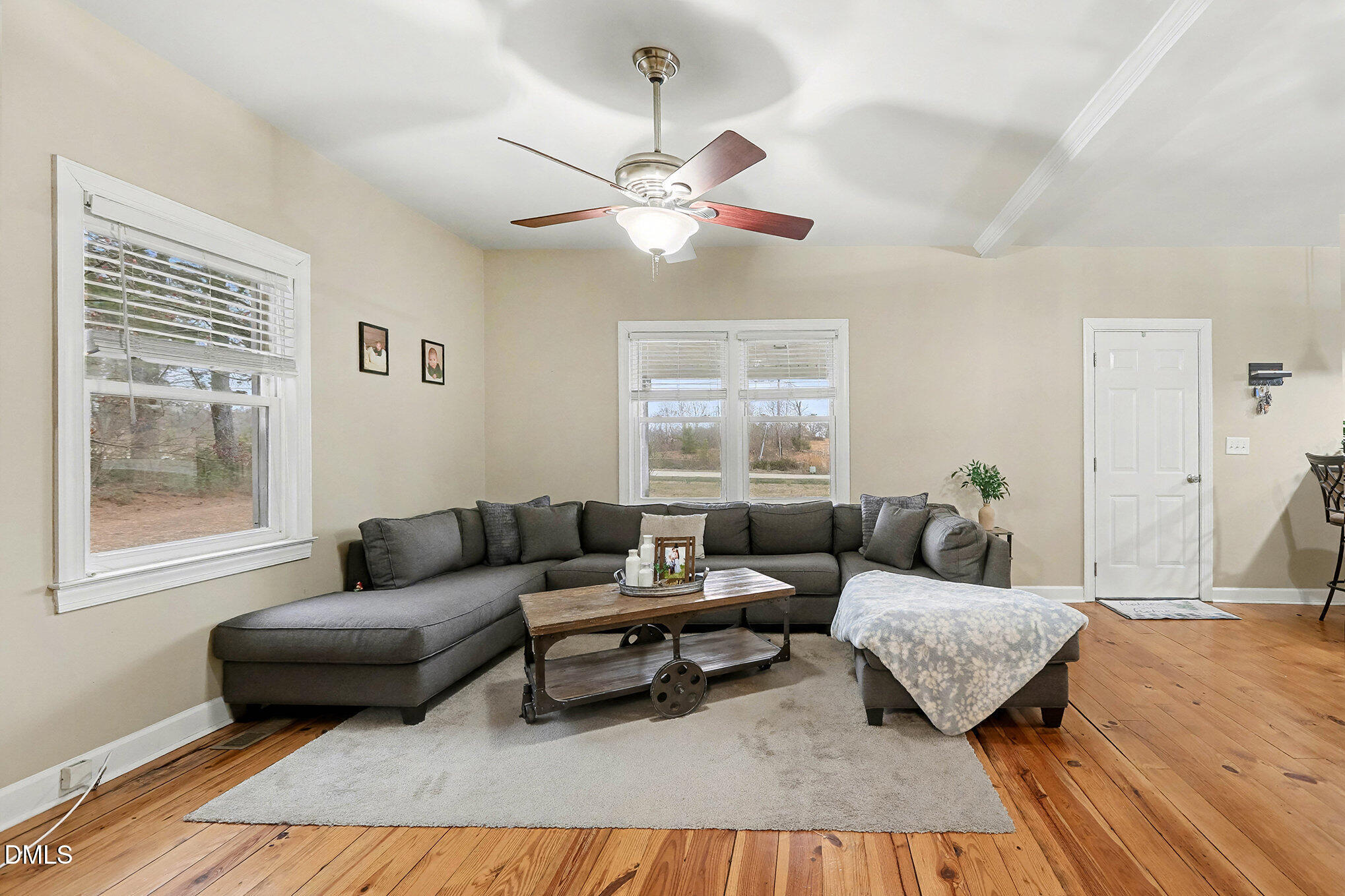 7228 Cleveland School Road Garner, NC 27529 - Photo 8 of 28 a living room with furniture and a window