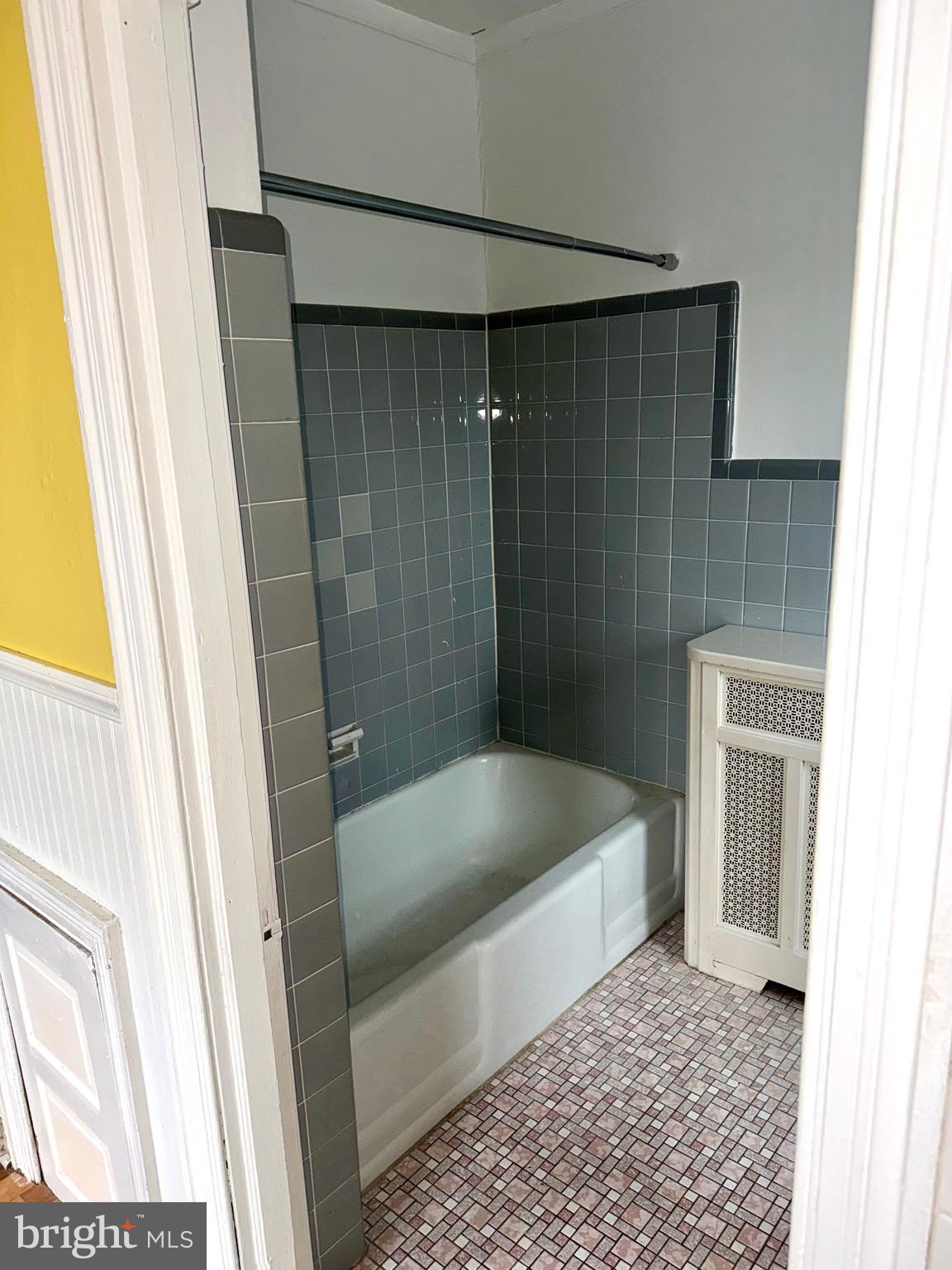 4515 Comly Street Philadelphia, PA 19135 - Photo 22 of 38 a bathroom with a bathtub and a shower