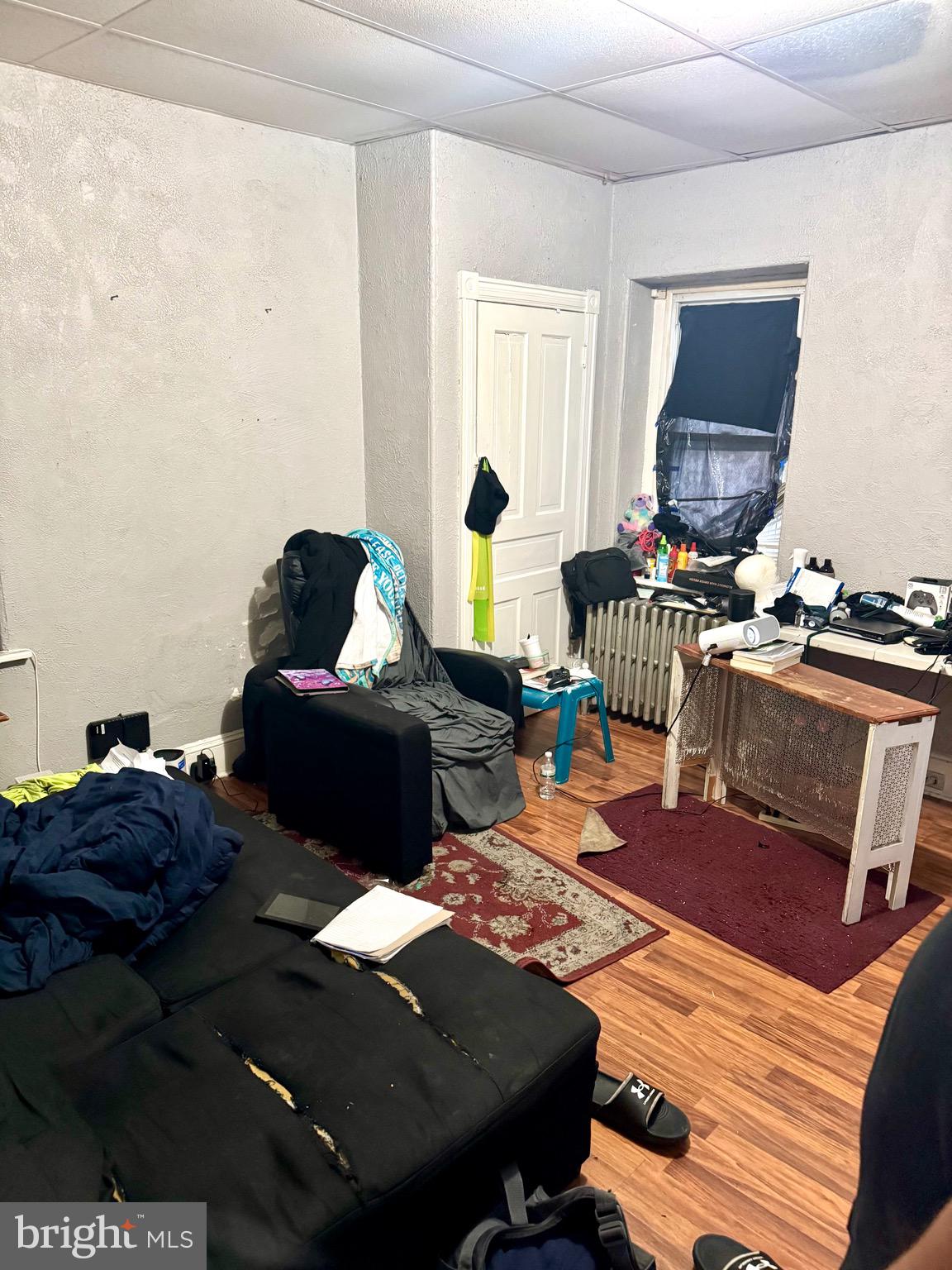 4515 Comly Street Philadelphia, PA 19135 - Photo 33 of 38 a living room with furniture and a window