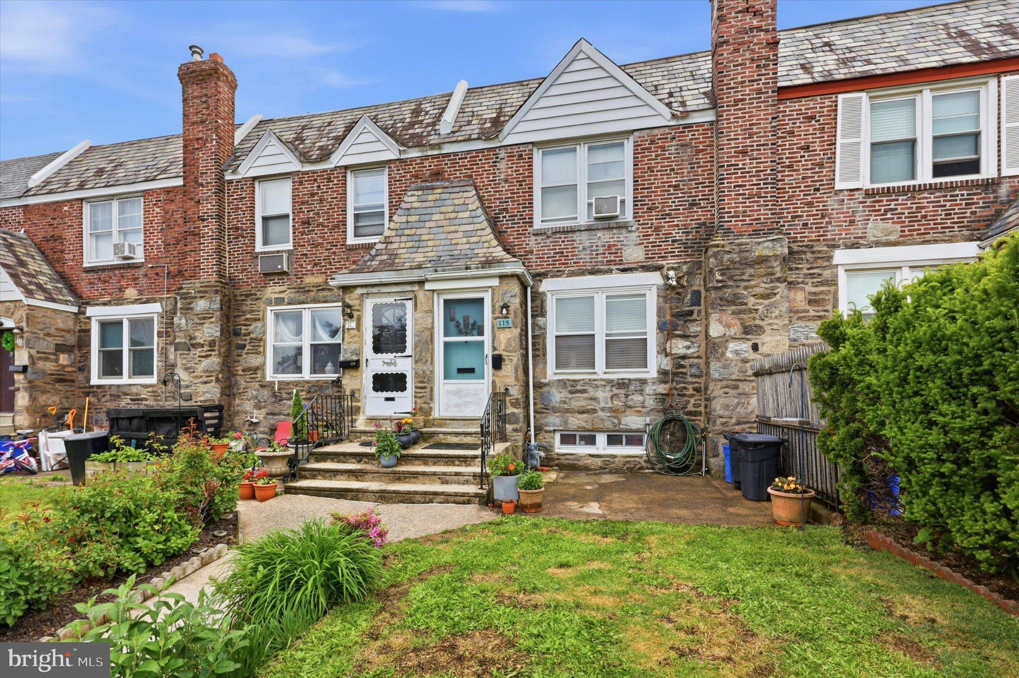 115 Academy Lane Upper Darby, PA 19082 - Photo 2 of 25 a front view of a house with a yard