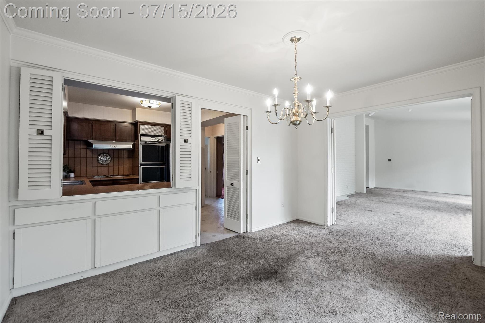 1151 Peveril Road Bloomfield Hills, MI 48304 - Photo 13 of 39 Dining room with cut out kitchen counter