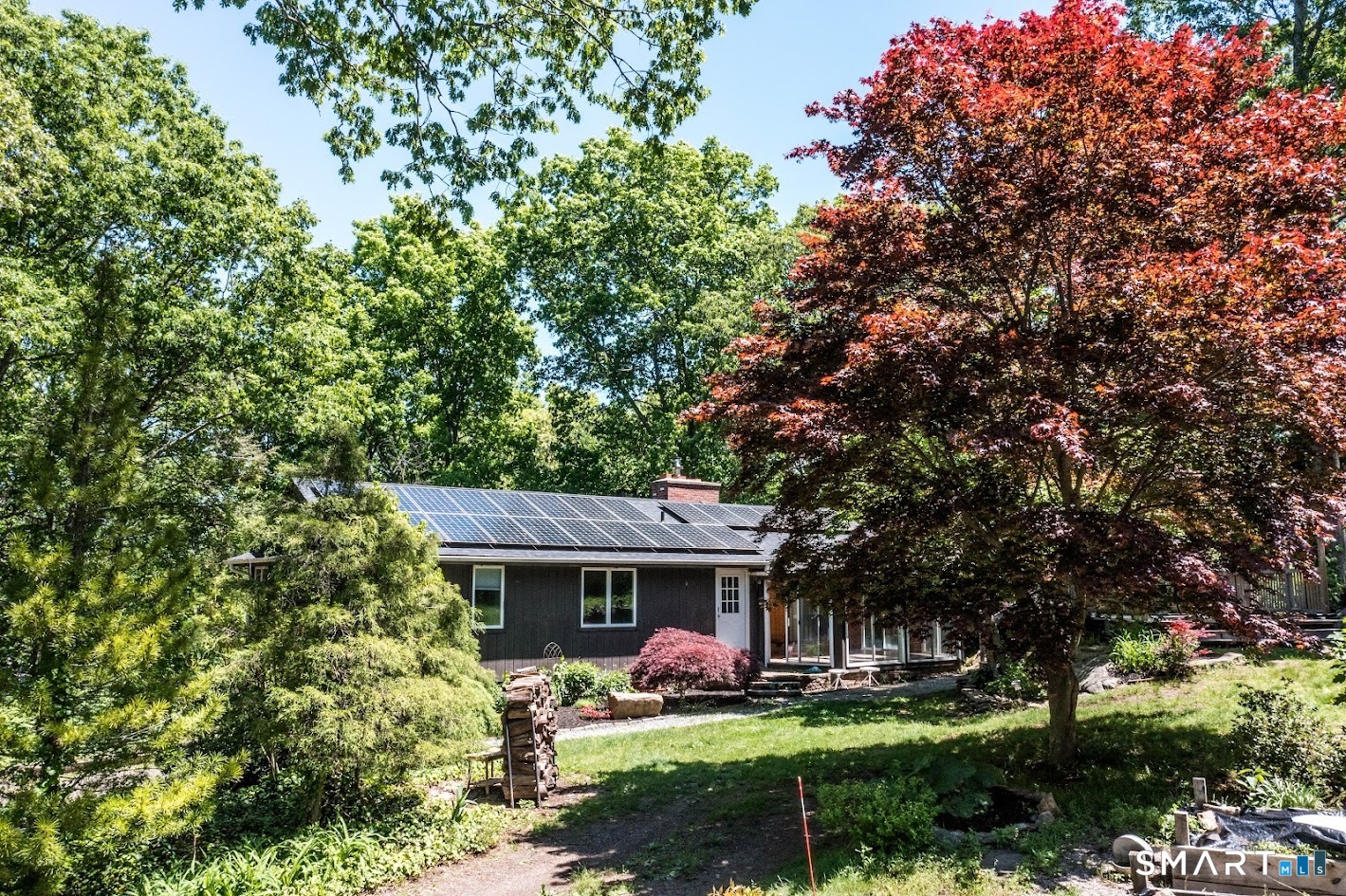 98 Fairy Dell Road Clinton, CT 06413 - Photo 24 of 25 Where the forest surrounds you and the sun helps pay the bills.