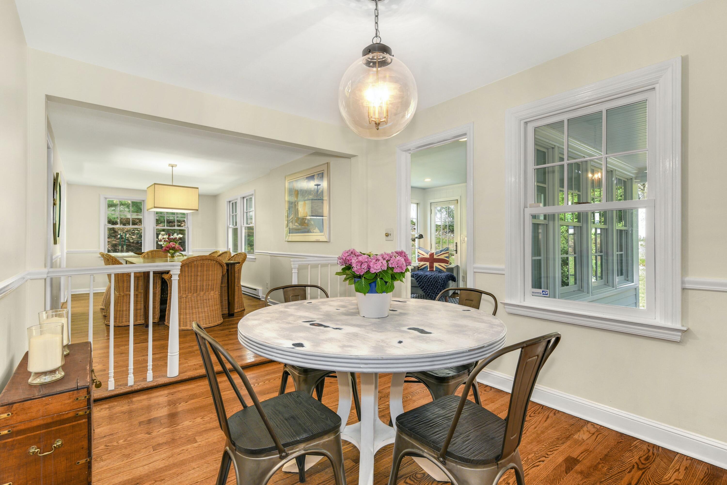 1 Fairmead Road Darien, CT 06820 - Photo 12 of 40 a view of a dining room with furniture and wooden floor