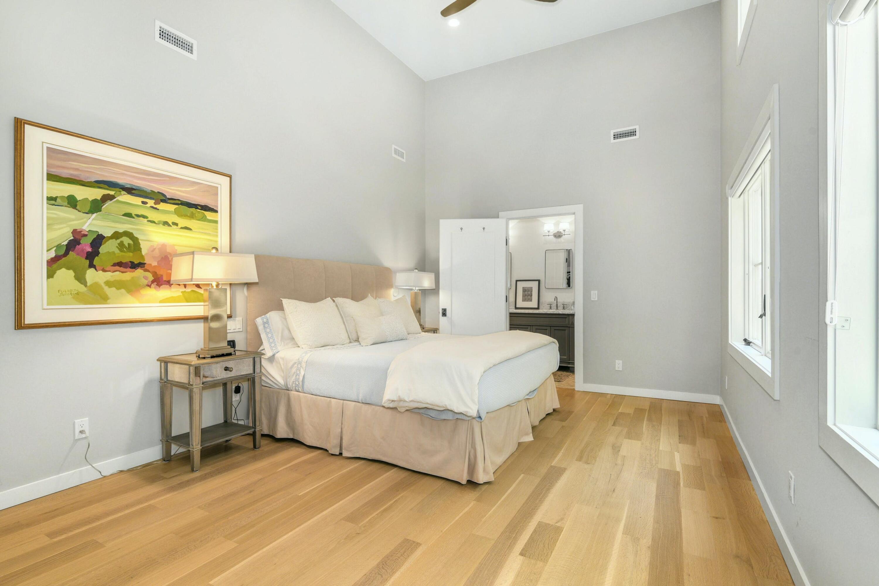 1 Fairmead Road Darien, CT 06820 - Photo 25 of 40 a spacious bedroom with a bed and a window