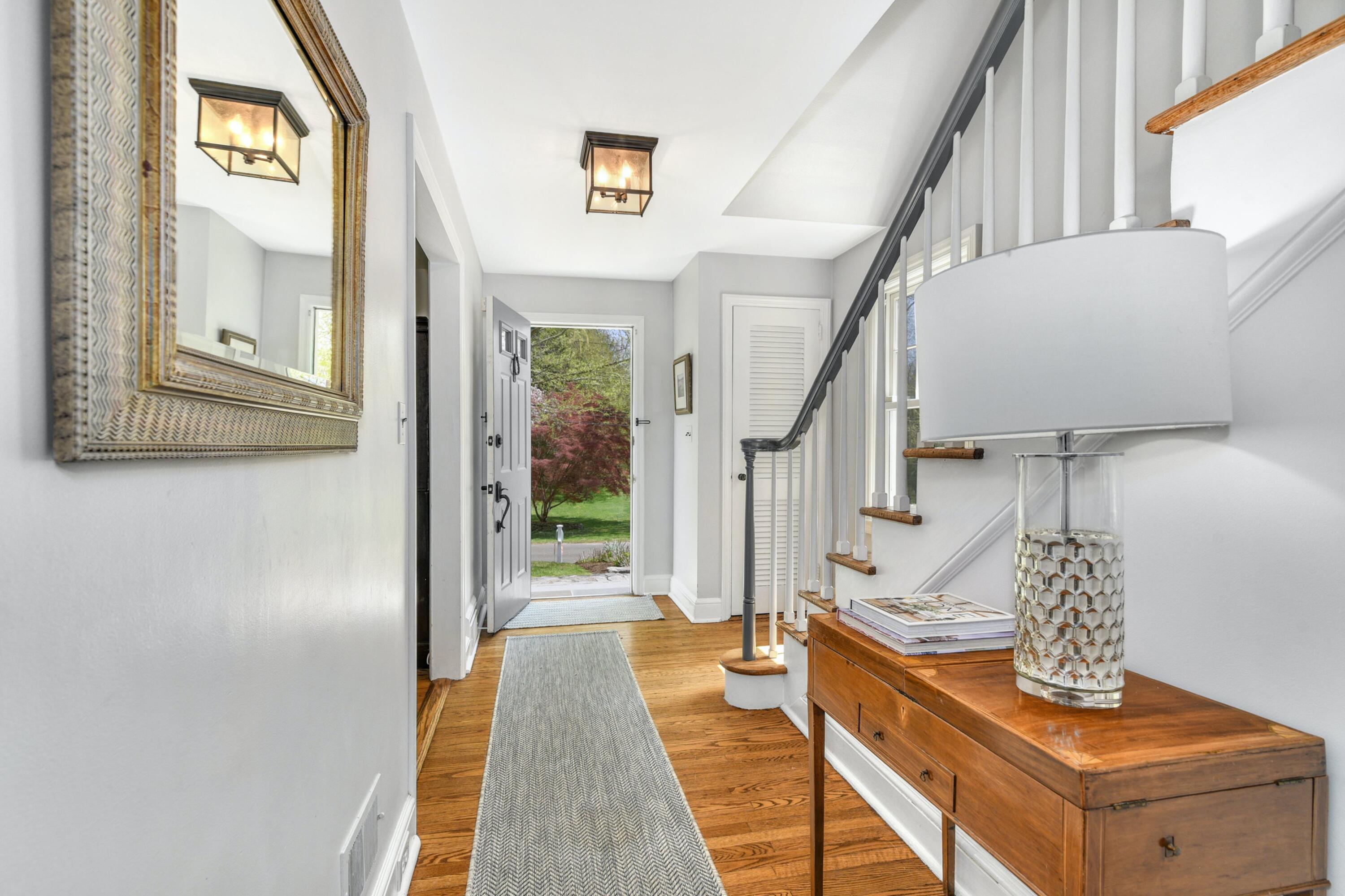 1 Fairmead Road Darien, CT 06820 - Photo 27 of 40 a view of entryway and hall with wooden floor