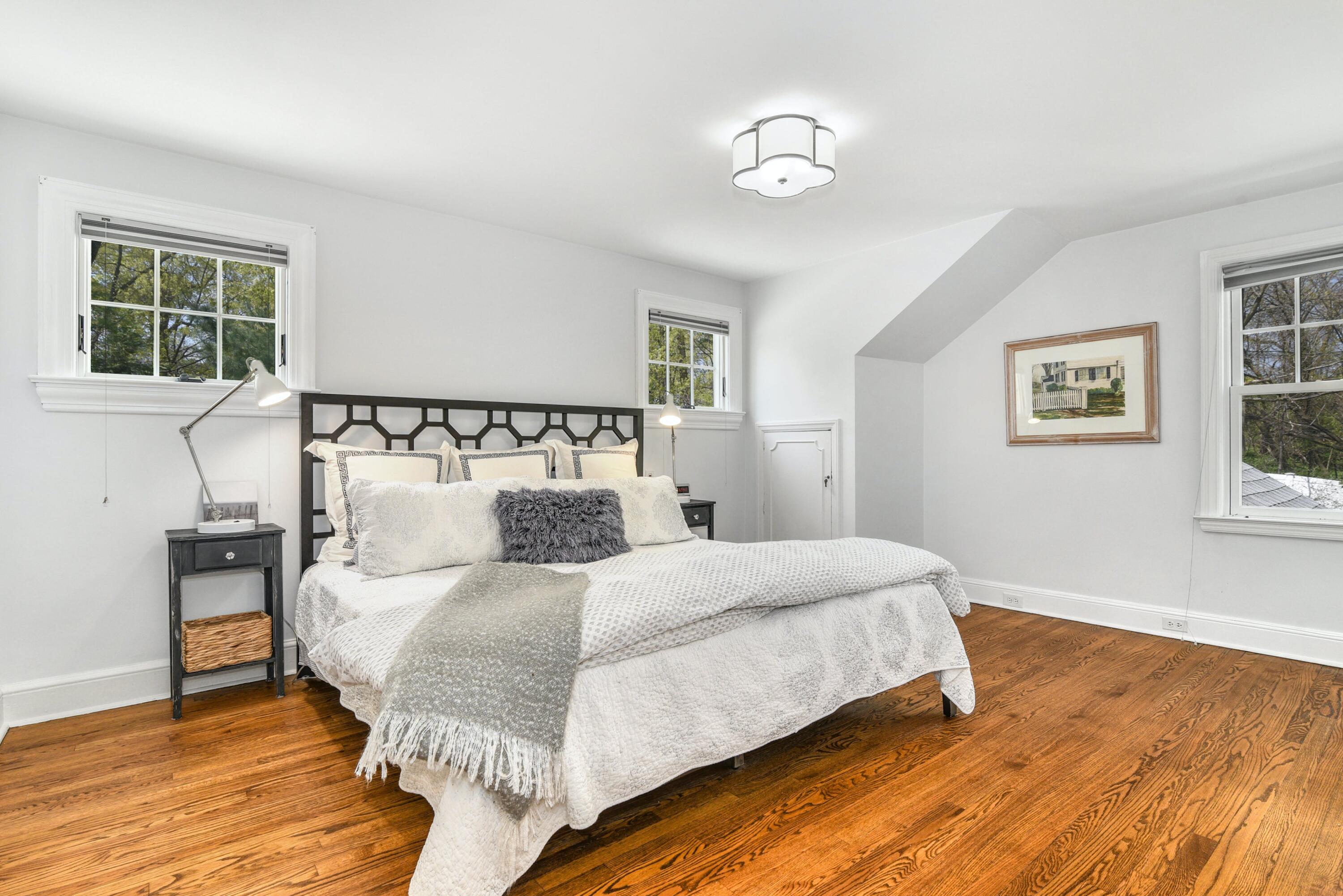 1 Fairmead Road Darien, CT 06820 - Photo 28 of 40 a bedroom with a large bed and a window