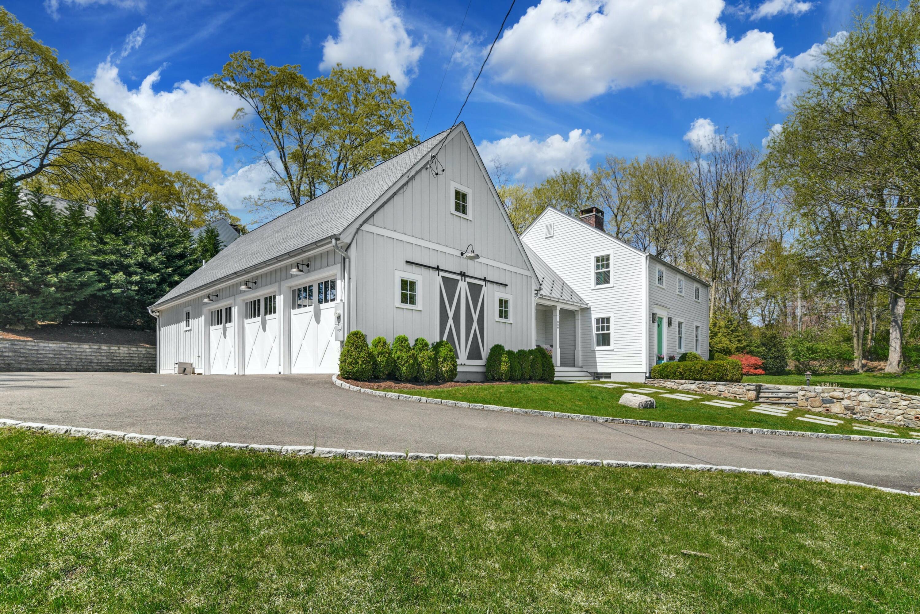 1 Fairmead Road Darien, CT 06820 - Photo 39 of 40 a front view of a house with a yard