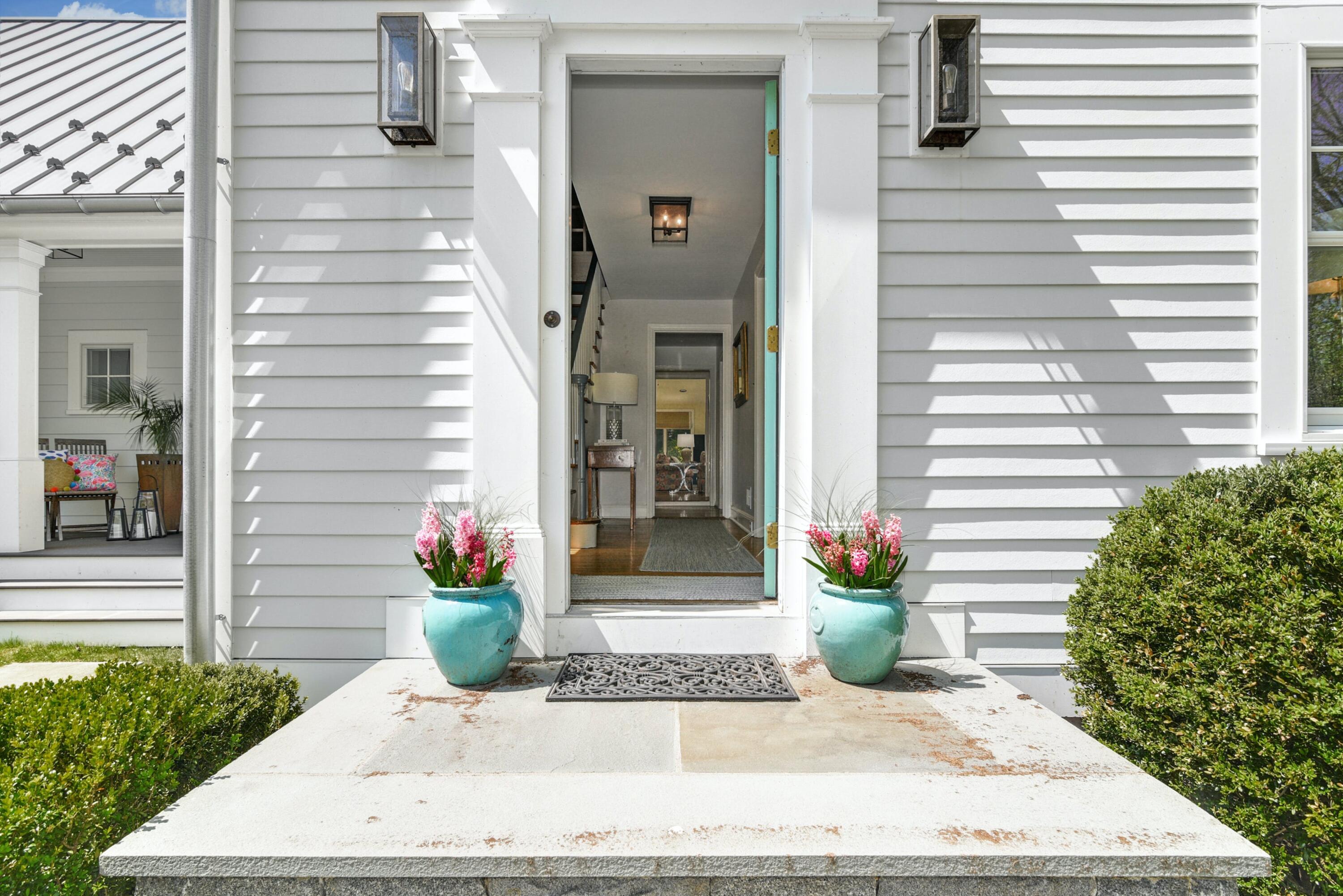 1 Fairmead Road Darien, CT 06820 - Photo 5 of 40 a potted plant sitting on the side of a building