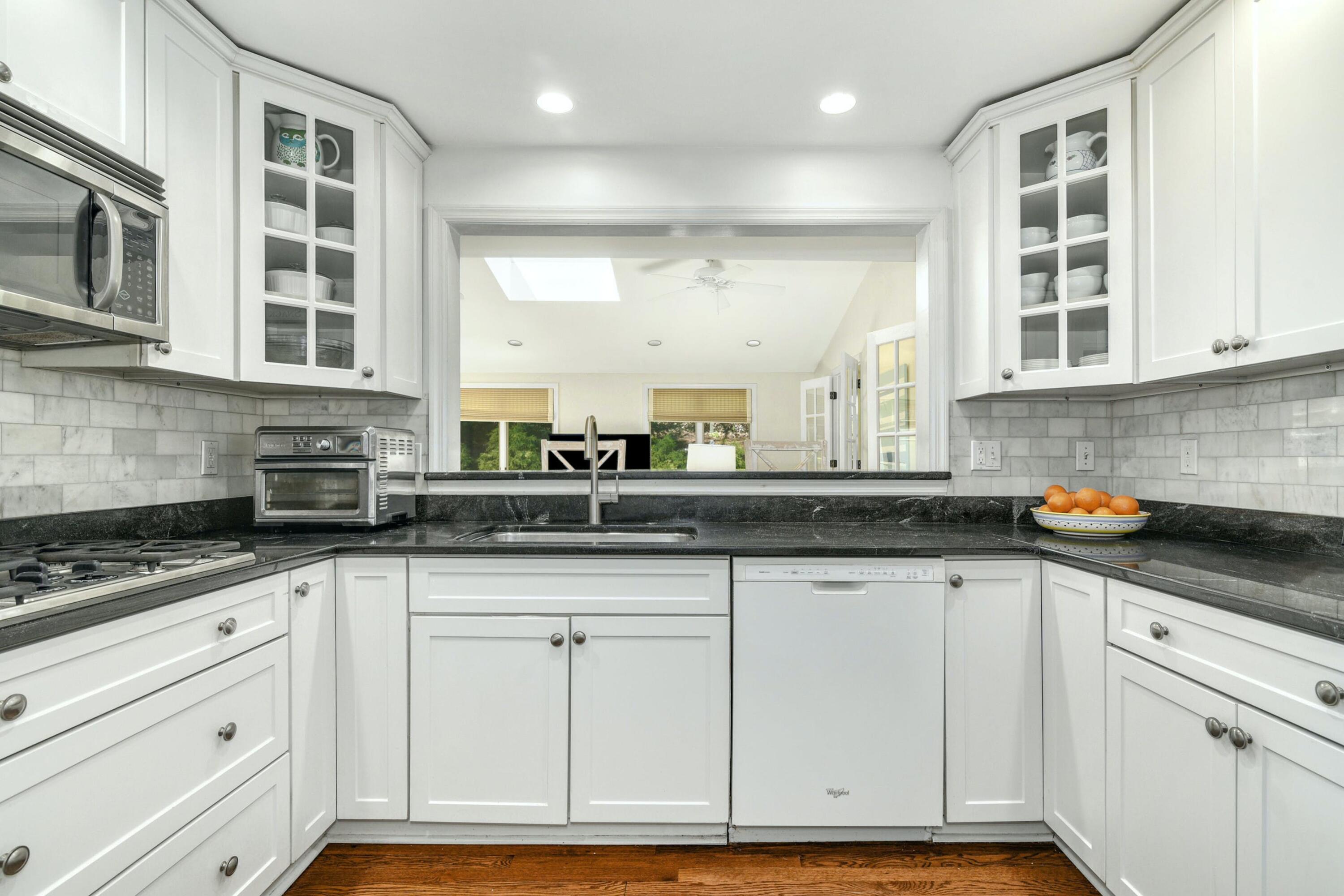 1 Fairmead Road Darien, CT 06820 - Photo 10 of 40 a kitchen with stainless steel appliances granite countertop a sink and cabinets