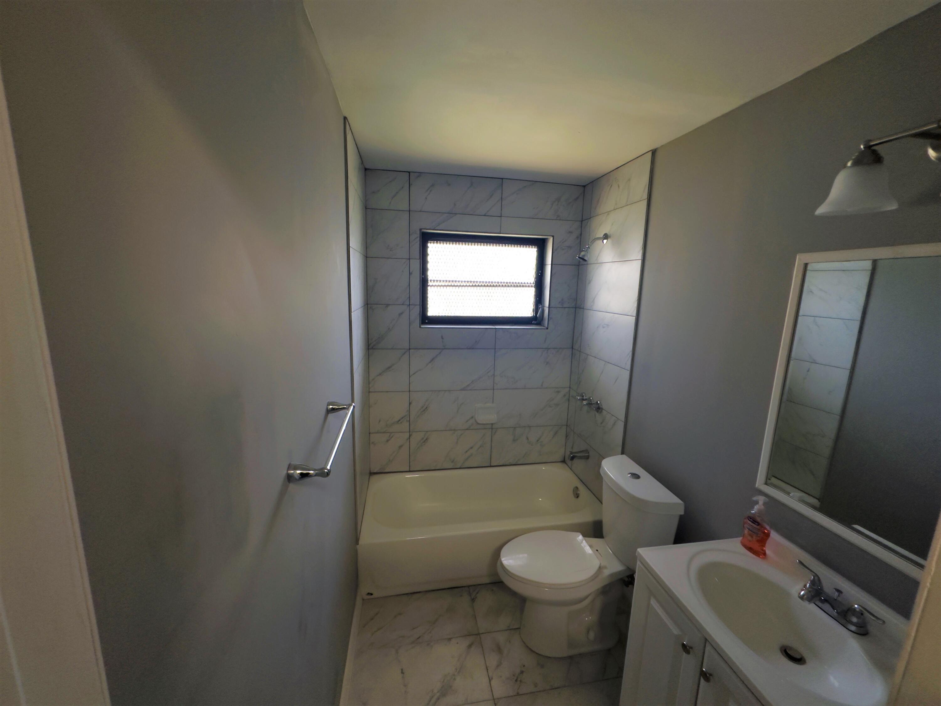 521 Silver Beach Road Riviera Beach, FL 33403 - Photo 6 of 10 521 Bathroom