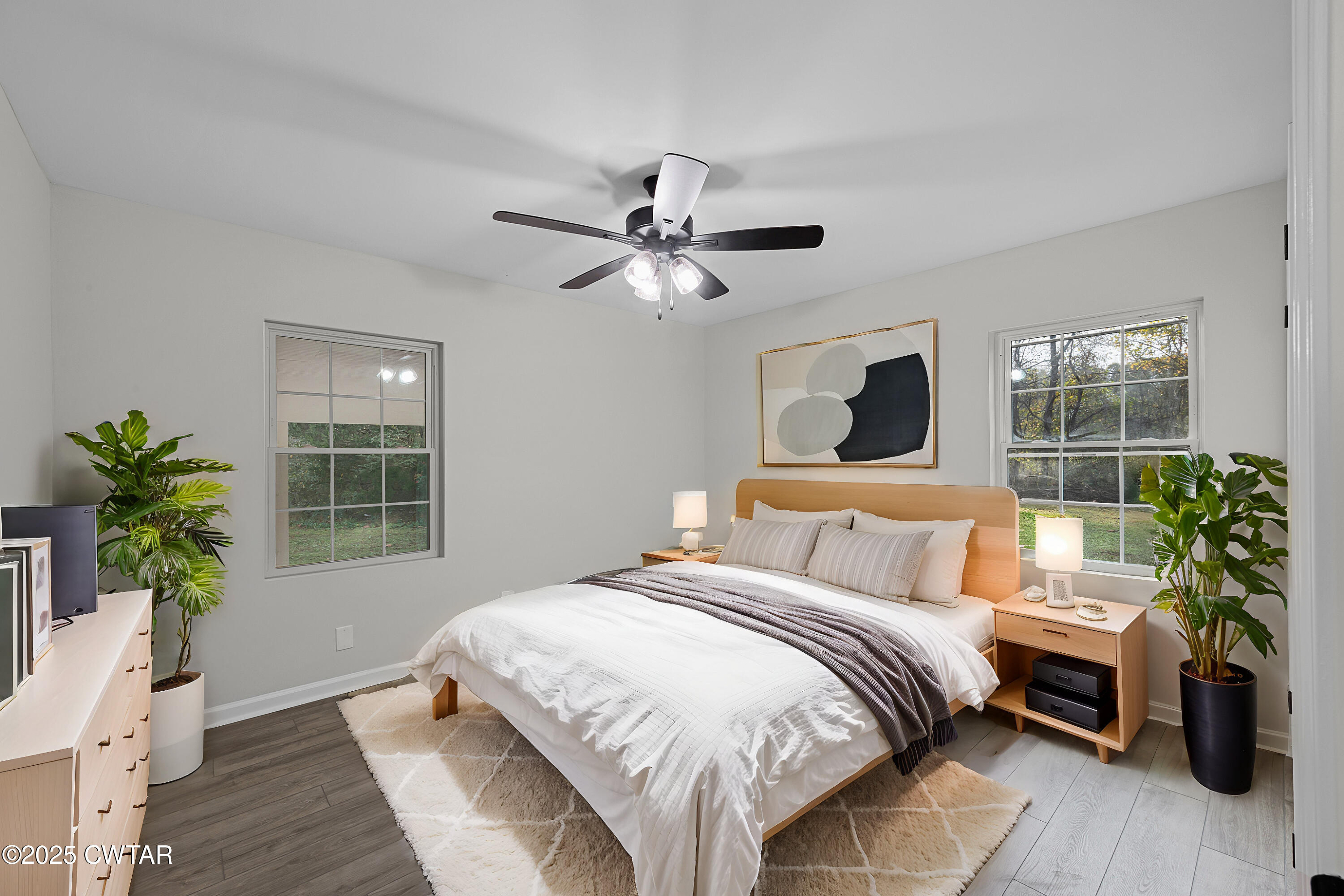 144 McLeary Road Jackson, TN 38305 - Photo 14 of 23 a bedroom with a large bed and a window