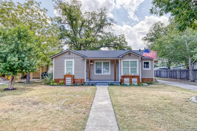 a view of a house with a patio