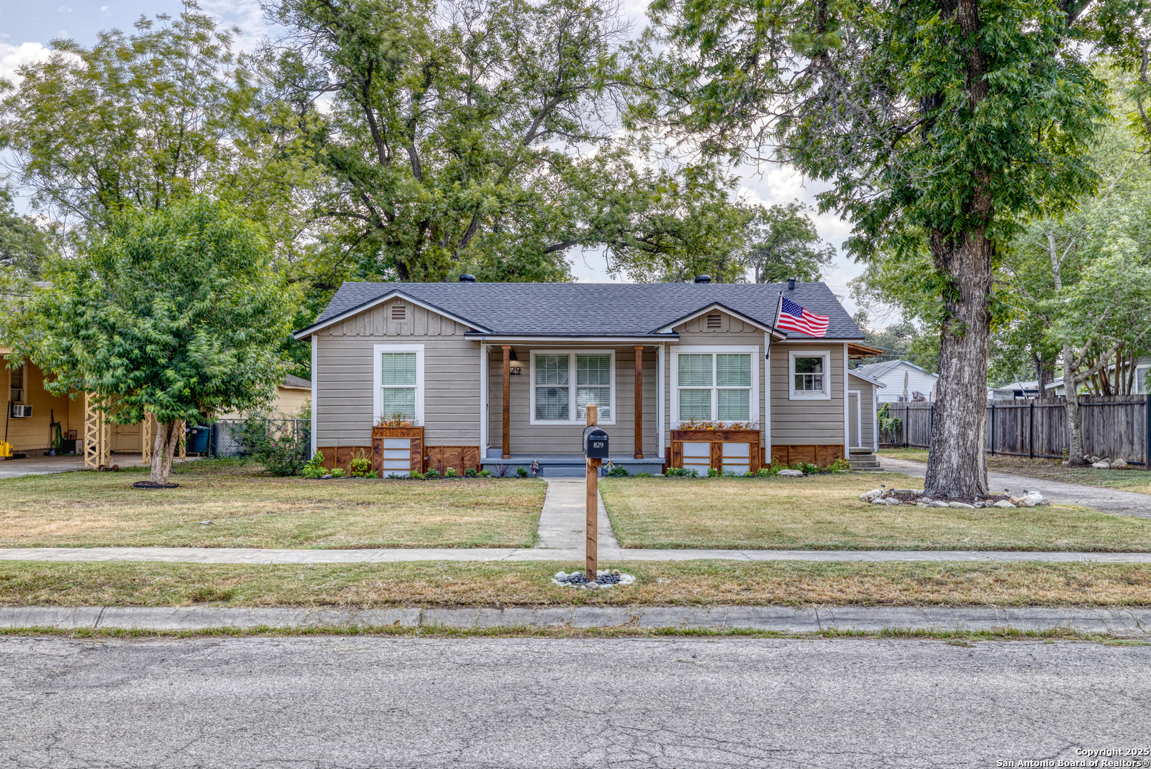829 Maple Street Uvalde, TX 78801 - Photo 3 of 33 a front view of a house with garden