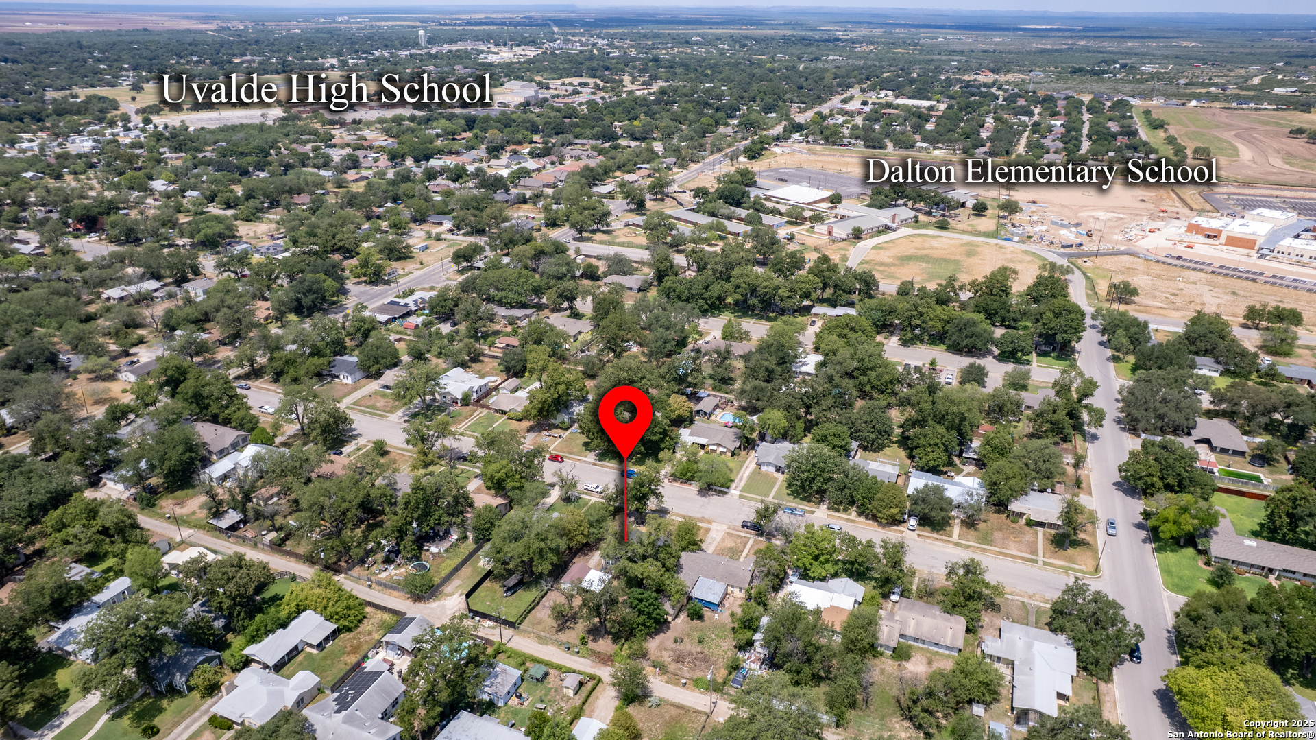 829 Maple Street Uvalde, TX 78801 - Photo 32 of 33 an aerial view of a city
