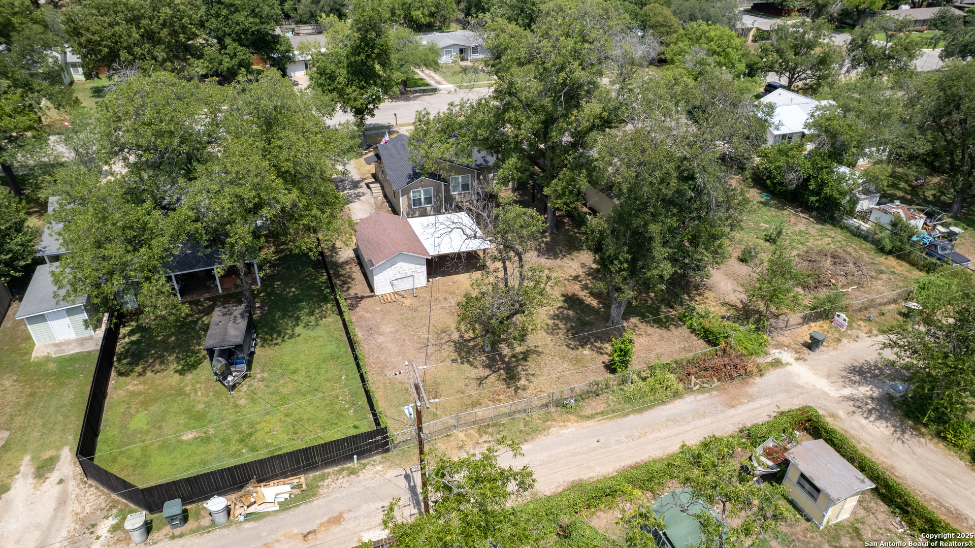 829 Maple Street Uvalde, TX 78801 - Photo 33 of 33 an aerial view of a house with a yard