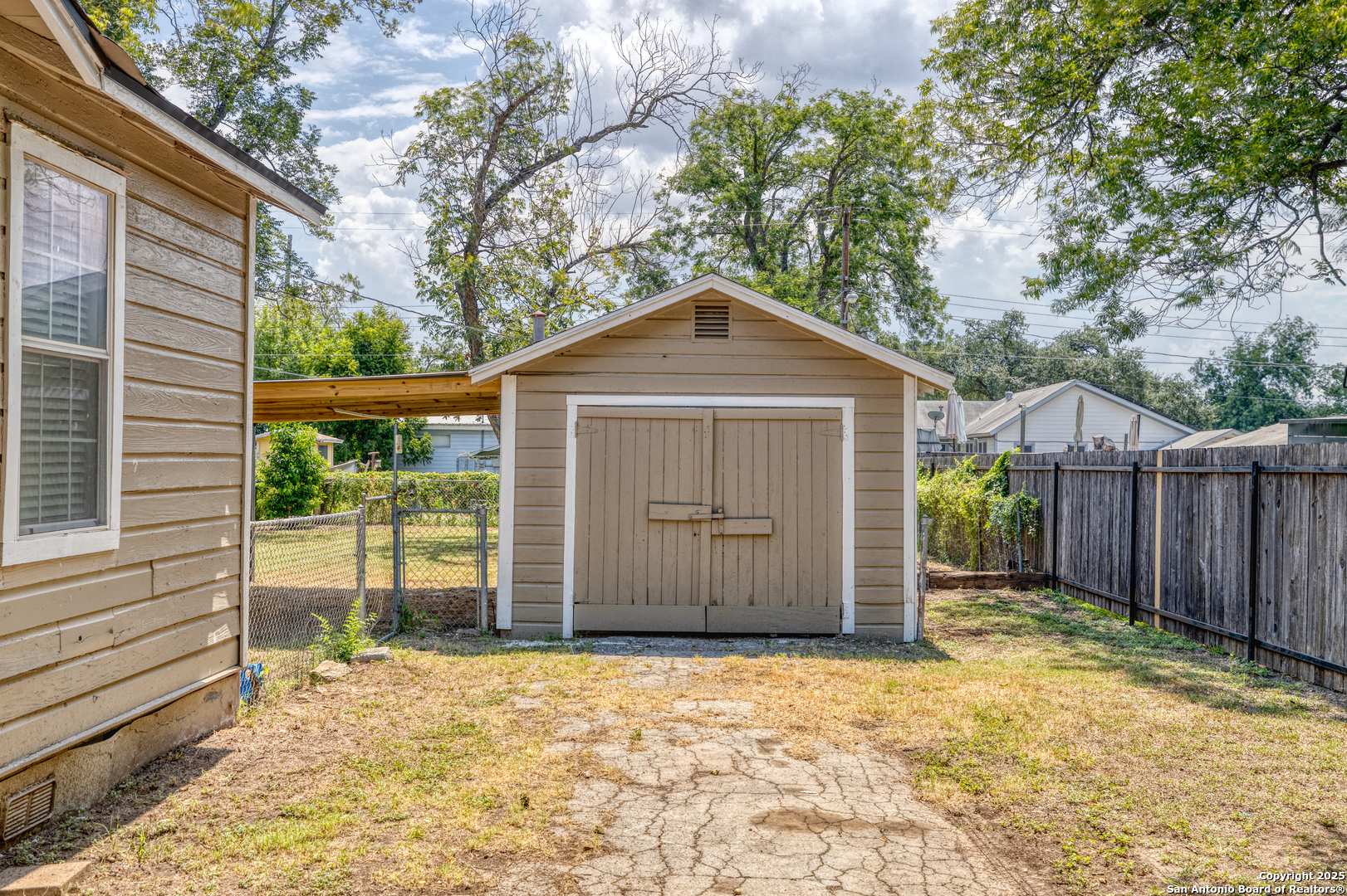 829 Maple Street Uvalde, TX 78801 - Photo 5 of 33 a front view of a house with a garage