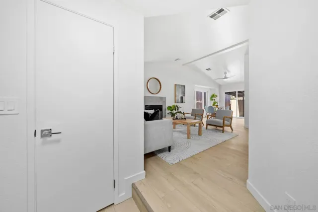 a view of living room with furniture and window