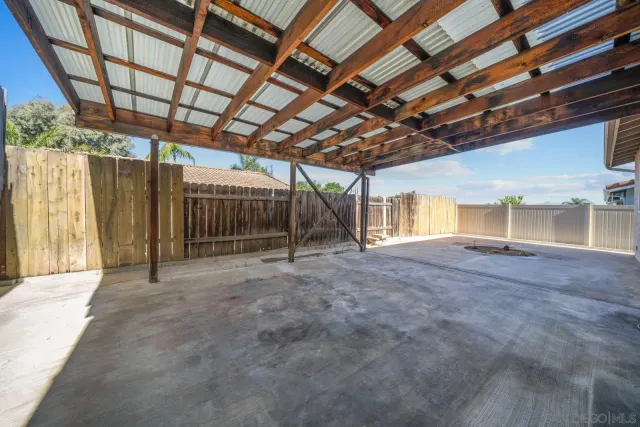 a view of an empty room with a garage